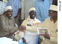 Sharif Hassan Sheik Aden, Speaker of the Somali Parliament, left, senior Islamic official Sheik Sharif Sheikh Ahmed , middle, and leader of the Islamic movement Sheikh Hassan Dahir Aweys, right, meet in Mogadishu, Tuesday Nov. 7, 2006