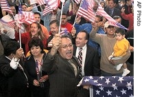 Demonstrators protest immigration restrictions in Farmer's Branch, Texas