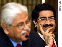 Chairman of the Aditya Birla Group Kumar Mangalam Birla, right, reacts as Managing Director of Hindalco Industries Ltd. Debu Bhattacharya replies  a question at a press conference in Mumbai, India, 11 Feb 2007