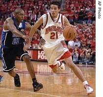 Maryland freshman guard Greivis Vasquez (21) drives past Duke's DeMarcus Nelson Feb. 11, 2007, in College Park, Maryland