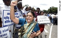 Sri Lankan Human Rights activists shout slogans during a protest against the eviction of ethnic Tamils in Colombo, 080 Jun 2007