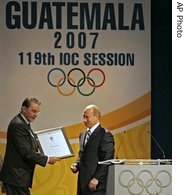 IOC President Jacques Rogge (l) and Russia's President Vladimir Putin during the presentation of Sochi as a bid to host the 2014 Winter Olympics 