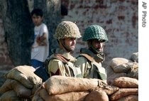 Soldiers man positions outside Islamabad's Red Mosque, 9 Jul 2007