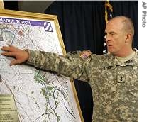 US Maj. Gen. Rick Lynch, Commanding General, 3rd Infantry Division and Multi-National Division-Center, briefs the media during a a press conference in the heavily fortified Green Zone in Baghdad