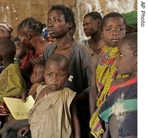 Displaced people gather for medical treatment at a MSF Holland field clinic in the village of Sido, Central African Republic, Feb 2007