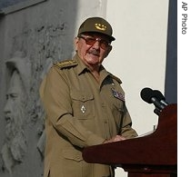 People wave Cuban flags during a ceremony to mark the 54th anniversary of the Revolution in Camaguey,  26 Jul 2007