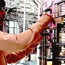 Patrons put their coins into the vending machine, open the door, and enjoy their takeaway food