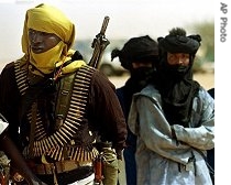 A group of Tuareg nomads near an army base in the Sahara desert north of Agadez, Niger (file photo)