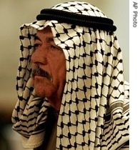 Ali Hassan al-Majid known as 'Chemical Ali' stands in court in Baghdad, Iraq, 24 June 2007