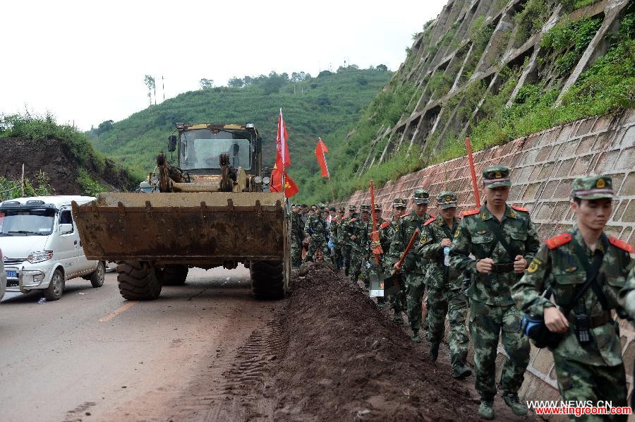 Rescuers run to the epicenter in quake-hit southwest China