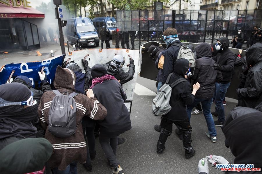 People take to streets to protest against the new labor law in Paris, France on May 17, 2016. In the latest protest against the French government