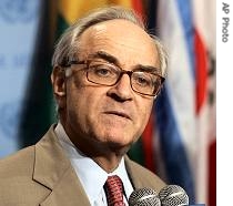 Jean-Marc de La Sabliere talks to reporters as he arrives for Security Council consultations at UN headquarters, August 7, 2006