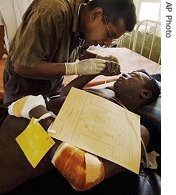 A Sri Lankan army soldier injured in an early morning battle with the Liberation Tigers of Tamil Eelam rebels near Tincomalee, 10 August 2006