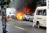 Soldier stands near site of an explosion in Colombo, Sri Lanka, Monday, August 14, 2006