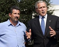 Rockey Vaccarella, left, looks on as President Bush talks about rebuilding Gulf Coast region on South Lawn of the White House 