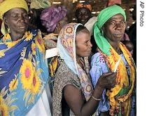 Nomad woman stand in a food line at a village near the small town of Dakoro, Niger