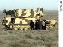 Iranian elite Revolutionary Guards stand guard at the site of Iran's nuclear enrichment facility in Natanz, 300 km south of capital Tehran, Iran 9 April 2007