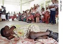 A young boy waits his turn to be tested for malaria, in Manhica, Mozambique (File photo)