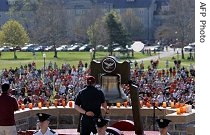 A white balloon(C-right), one of 32 for each of the Virginia Tech shooting victims is released during the moment of silence on the campus, 23 Apr 2007