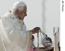 Pope Benedict XVI wafts incense around the altar during the canonization mass of Antonio Galvao, in Sao Paulo, 11 May 2007