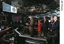 President Bush gestures during a statement after meetings at the National Counterterrorism Center on Tuesday, Aug. 15, 2006 in McLean, Va