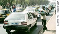 Traffic hawkers in the streets of Dakar, Senegal