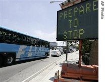 Traffic backs up at a vehicle checkpoint at Los Angeles International Airport after security measures were tightened following bombing attempts in Britain