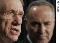 US Senate Majority Leader Senator Harry Reid (L), and Democratic Senator from New York Charles Schumer (R) during a press conference in the Senate Radio-Television Gallery  