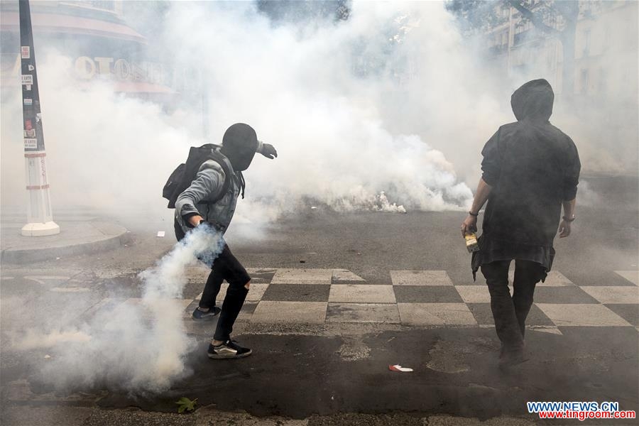 People take to streets to protest against the new labor law in Paris, France on May 17, 2016. In the latest protest against the French government